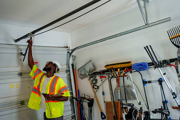Professional Garage Door Panel Replacement technician working in Round Lake Park, IL